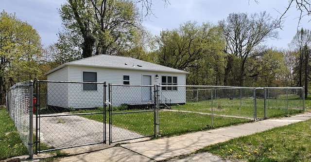 exterior space with a gate and fence