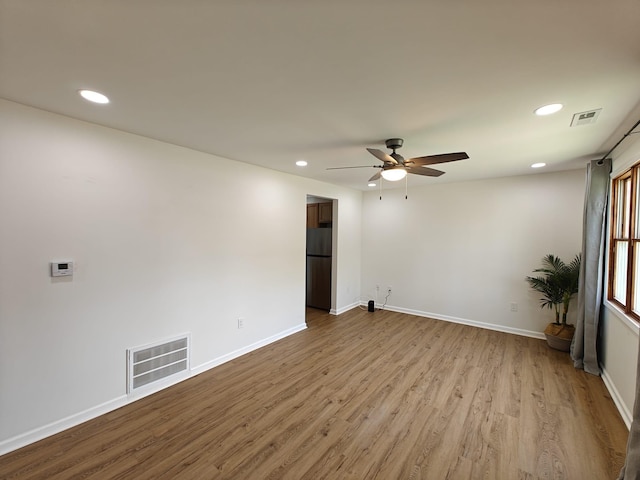 unfurnished room with a ceiling fan, recessed lighting, and visible vents