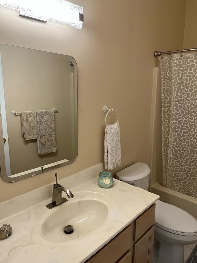 28848 5 Mile Rd Unit 11, Livonia, MI 48154 - bathroom with shower / bath combination with curtain, toilet, and vanity