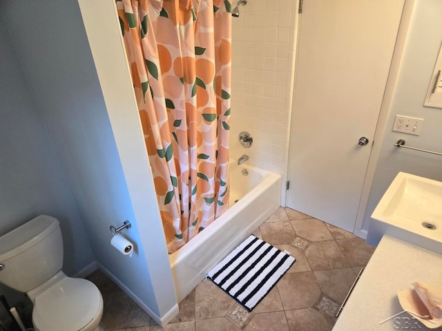 8570 Hornbeam Ln, Saginaw, MI 48603 - bathroom featuring shower / bath combo with shower curtain, toilet, tile patterned floors, and vanity