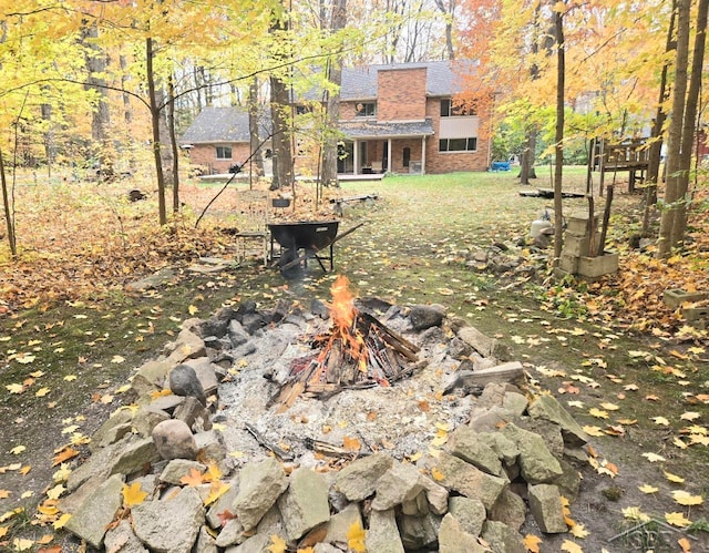 8570 Hornbeam Ln, Saginaw, MI 48603 - view of yard featuring a fire pit