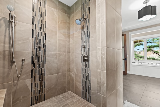 5744 Wyndam Ln, Brighton, MI 48116 - bathroom featuring tile patterned floors and a tile shower