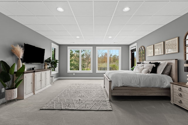 5744 Wyndam Ln, Brighton, MI 48116 - bedroom featuring a paneled ceiling, carpet, baseboards, and recessed lighting