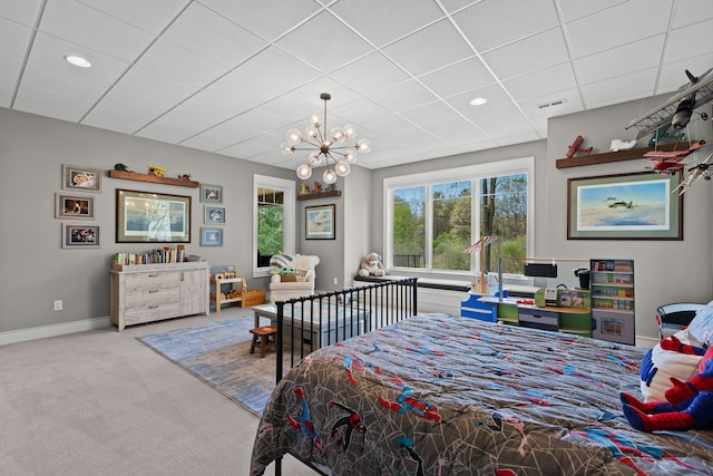 5744 Wyndam Ln, Brighton, MI 48116 - carpeted bedroom featuring baseboards, a drop ceiling, a chandelier, and visible vents