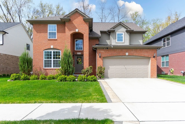 traditional-style home featuring an attached garage, concrete driveway, brick siding, and a front yard