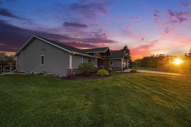 view of property exterior with a yard