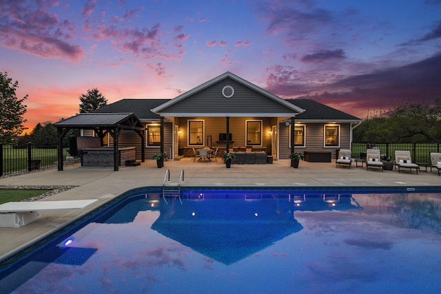 view of pool with a patio, fence, an outdoor living space, a gazebo, and a fenced in pool