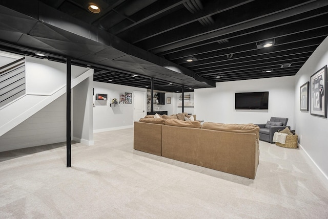 interior space with carpet flooring and baseboards