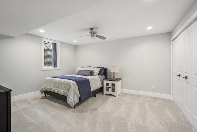 bedroom with baseboards, ceiling fan, recessed lighting, and light colored carpet