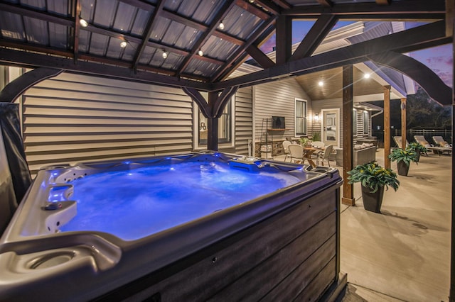 view of patio featuring a hot tub
