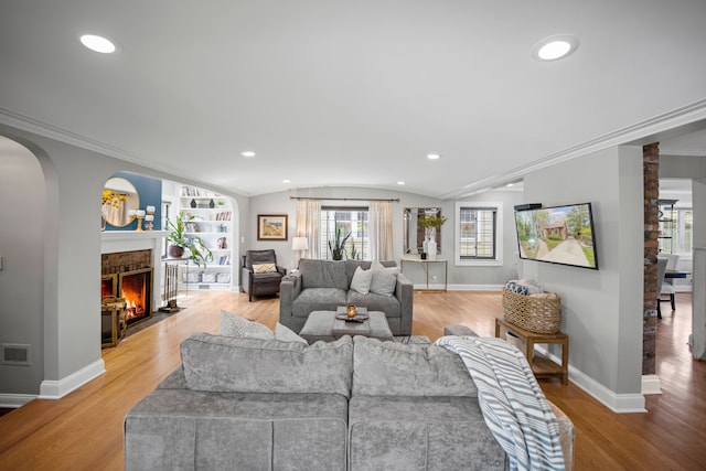 33 Sylvan Ave, Pleasant Ridge, MI 48069 - living room with vaulted ceiling, light wood finished floors, and recessed lighting