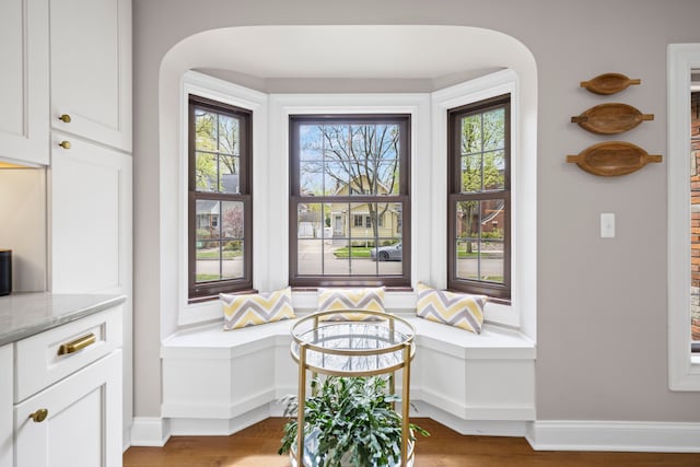 33 Sylvan Ave, Pleasant Ridge, MI 48069 - interior space with baseboards, arched walkways, and wood finished floors