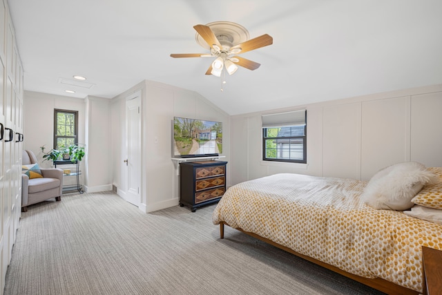 33 Sylvan Ave, Pleasant Ridge, MI 48069 - bedroom featuring lofted ceiling, multiple windows, a ceiling fan, and light colored carpet