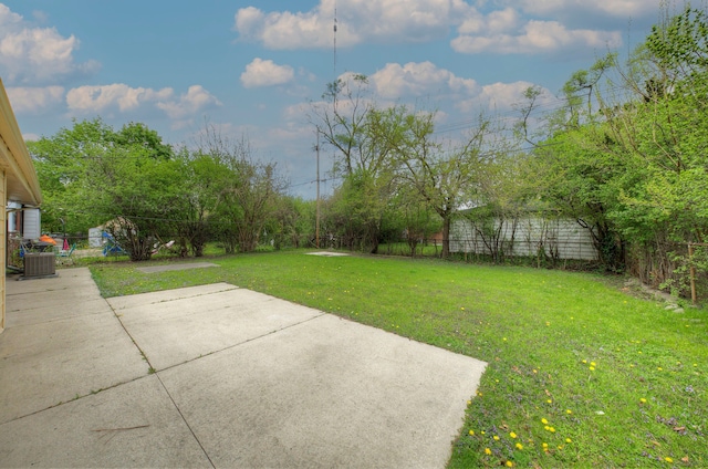 view of yard with a patio and cooling unit