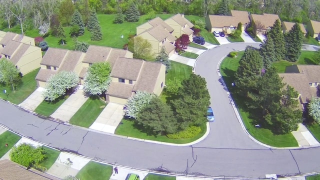 birds eye view of property with a residential view