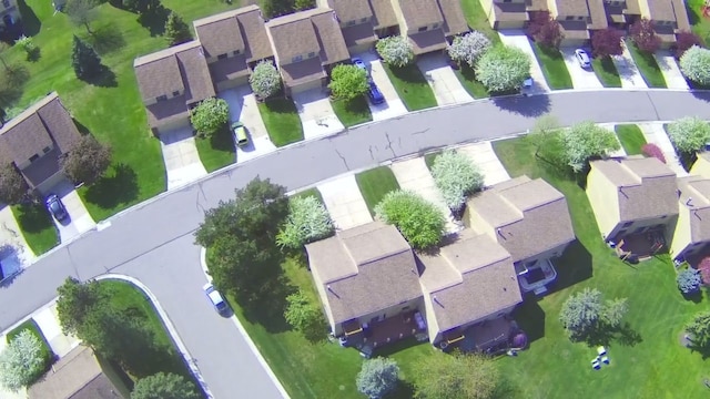 birds eye view of property with a residential view