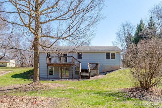back of property featuring a yard, a wooden deck, and stairs