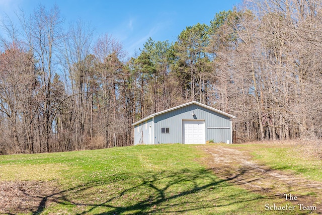 exterior space featuring a wooded view