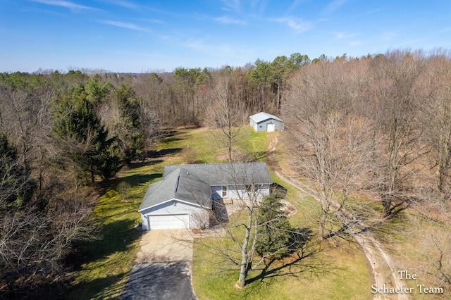 aerial view featuring a view of trees