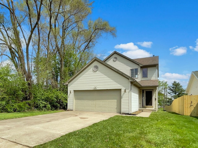 1555 S Harris Rd, Ypsilanti, MI 48198 - traditional home with driveway, fence, an attached garage, a front yard, and roof with shingles