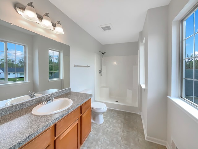 1555 S Harris Rd, Ypsilanti, MI 48198 - full bathroom with toilet, a shower, vanity, visible vents, and tile patterned flooring