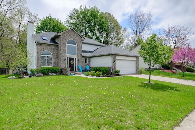 traditional-style home featuring brick siding, an attached garage, a chimney, driveway, and a front yard