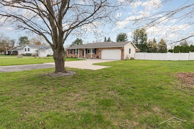 single story home featuring concrete driveway, brick siding, an attached garage, and fence