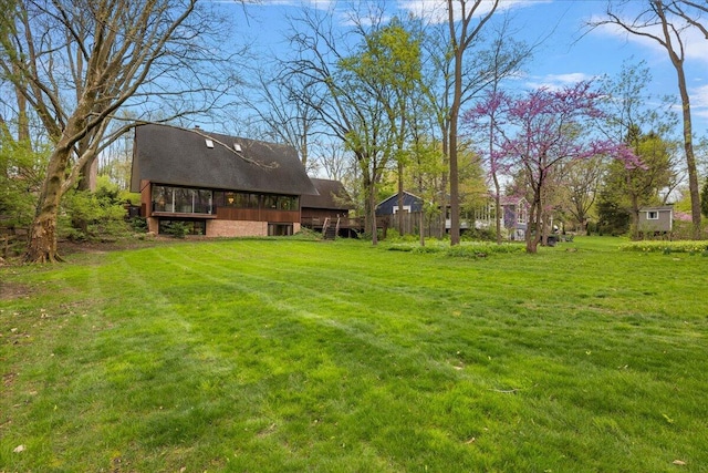 view of yard with a deck