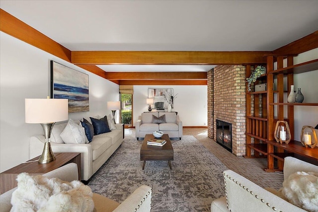 carpeted living room featuring a fireplace and beamed ceiling