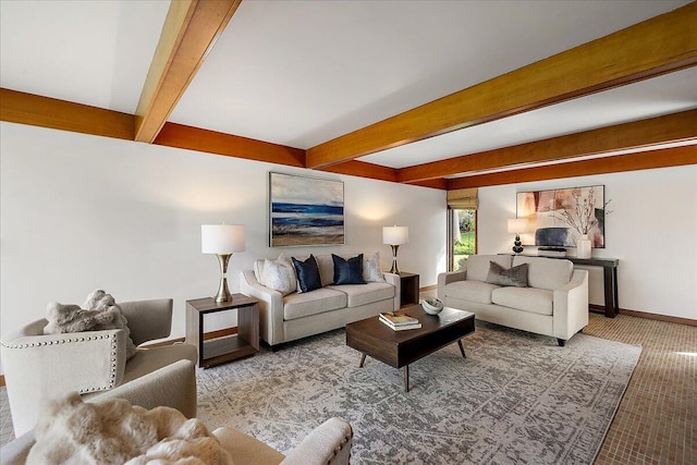 living area featuring baseboards, carpet flooring, and beam ceiling
