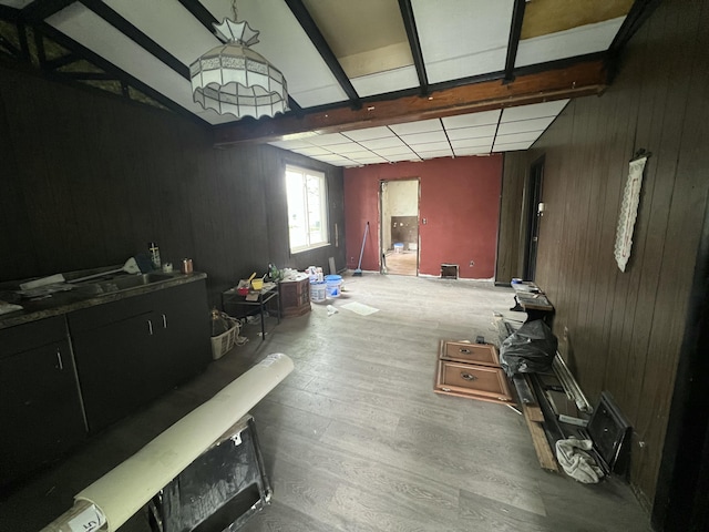 75 Abbott St, River Rouge, MI 48218 - misc room with beamed ceiling, wooden walls, and wood finished floors