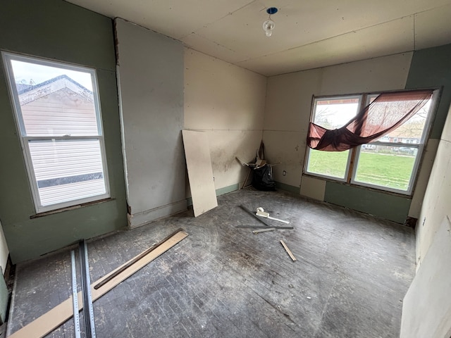 unfurnished room with a wealth of natural light