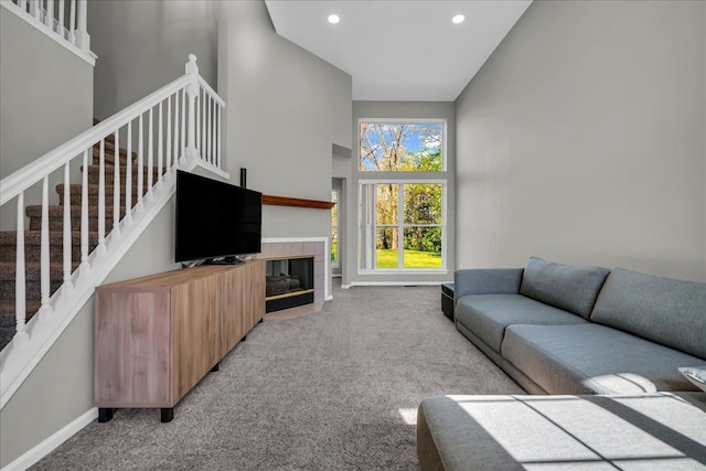 863 Calpernia, Wixom, MI 48393 - living area featuring carpet floors, stairway, recessed lighting, baseboards, and a towering ceiling