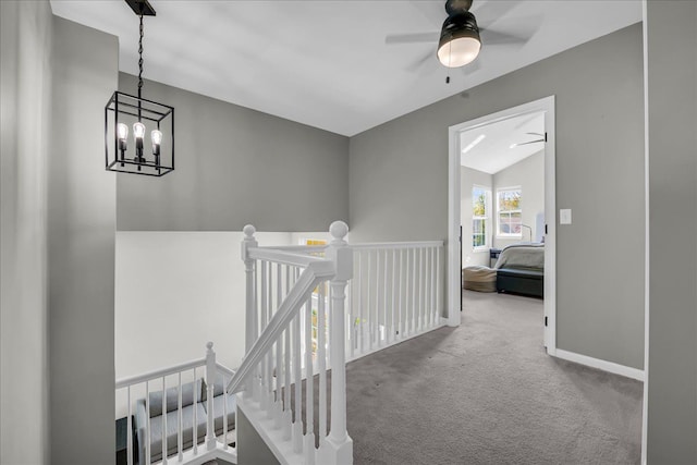 863 Calpernia, Wixom, MI 48393 - corridor featuring an upstairs landing, carpet floors, baseboards, and a chandelier