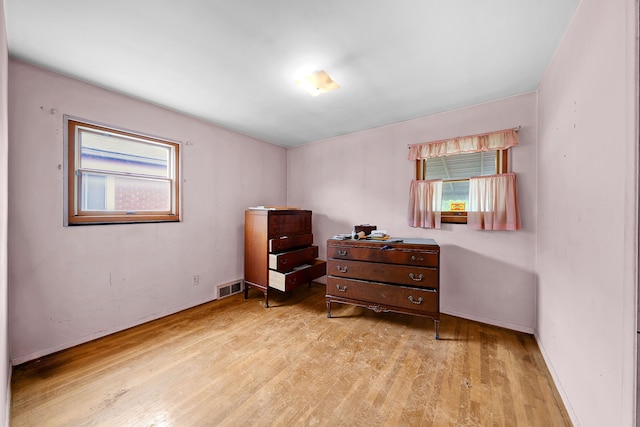 23022 Lexington Ave, Eastpointe, MI 48021 - bedroom featuring baseboards, visible vents, and wood finished floors