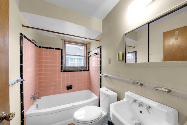 23022 Lexington Ave, Eastpointe, MI 48021 - full bathroom featuring toilet, a sink, and shower / washtub combination