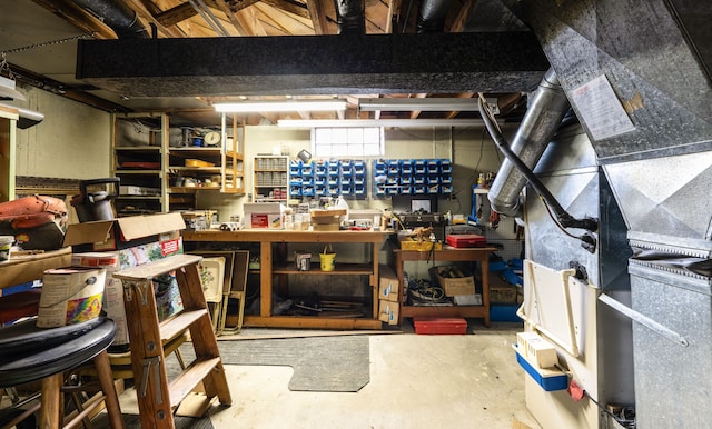 23022 Lexington Ave, Eastpointe, MI 48021 - basement with heating unit and a workshop area