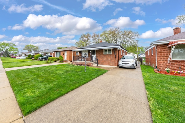 23022 Lexington Ave, Eastpointe, MI 48021 - view of front facade featuring covered porch, concrete driveway, brick siding, and a front yard