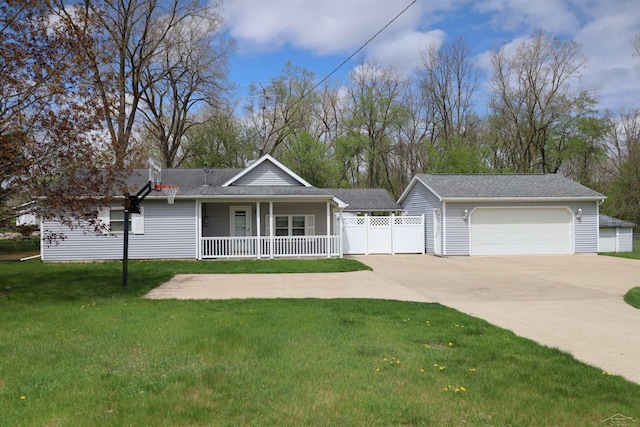 ranch-style house with a porch, fence, driveway, a garage, and a front yard
