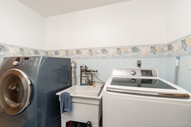 laundry area featuring independent washer and dryer
