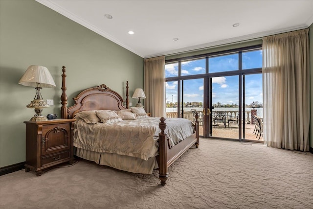 bedroom featuring access to exterior, crown molding, baseboards, light colored carpet, and recessed lighting
