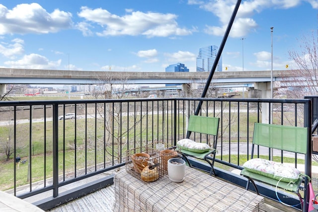 balcony featuring a city view