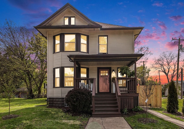 view of front facade with a porch and a front yard