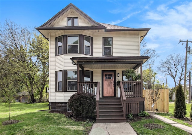 view of front facade featuring a porch and a front yard