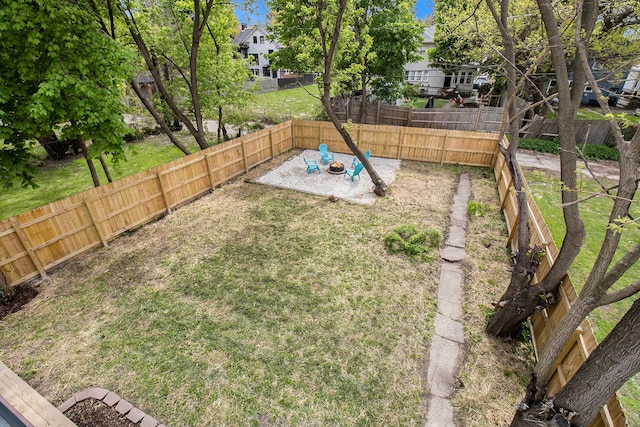 view of yard with a fenced backyard