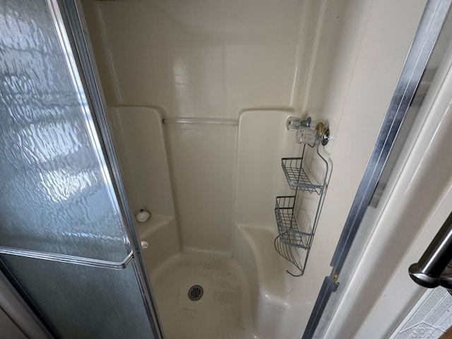 full bathroom with a stall shower