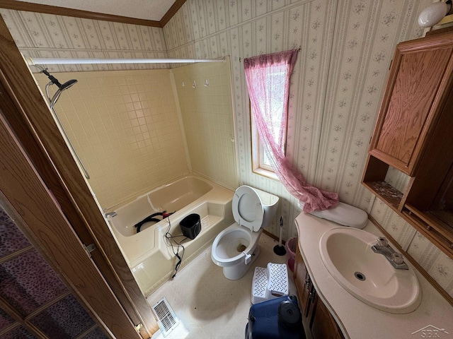 full bathroom featuring toilet, wallpapered walls, bathing tub / shower combination, visible vents, and vanity