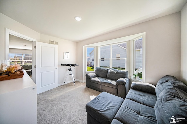 809 Sarah Ln, Milan, MI 48160 - living room featuring light carpet, baseboards, and recessed lighting