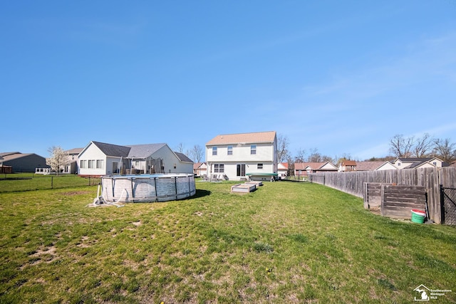 809 Sarah Ln, Milan, MI 48160 - view of yard with a fenced backyard, a fenced in pool, and a residential view