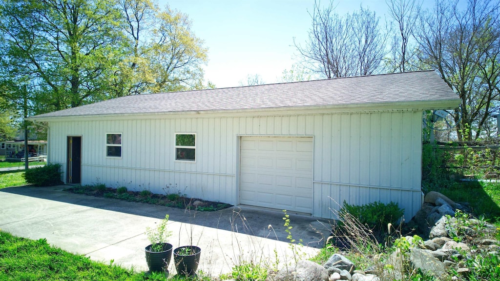 garage featuring driveway